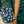 Load image into Gallery viewer, A person wearing a sling bag across their body. The bag features a pattern of white geese and apples all over.