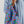 Load image into Gallery viewer, A person holding a Reusable shopping bag featuring illustrated strawberry clusters against a light periwinkle background. White background.