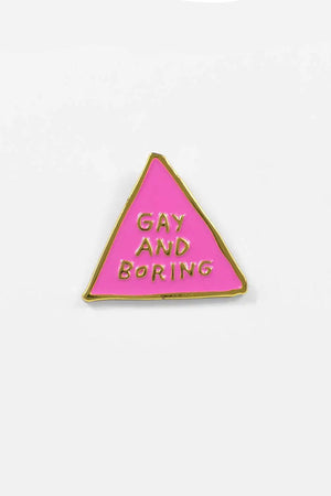 Pink triangle enamel pin that says Gay and Boring. White background.