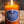 Load image into Gallery viewer, Amber glass candle with raw edge cork top. Blue label that says Whiskey and Tobacco. Natural wood backdrop.