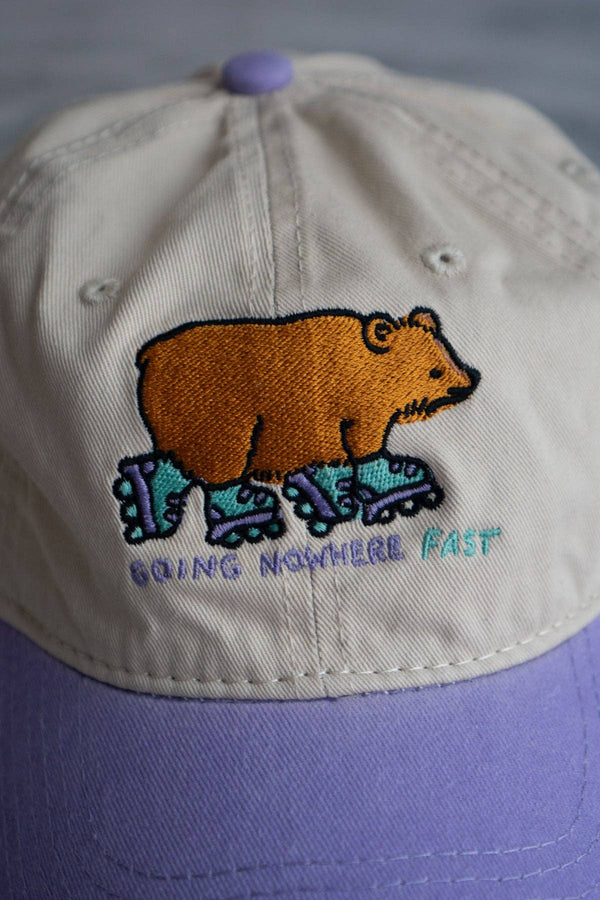 Going Nowhere Fast Two-Tone Dad Hat: Cream / purple