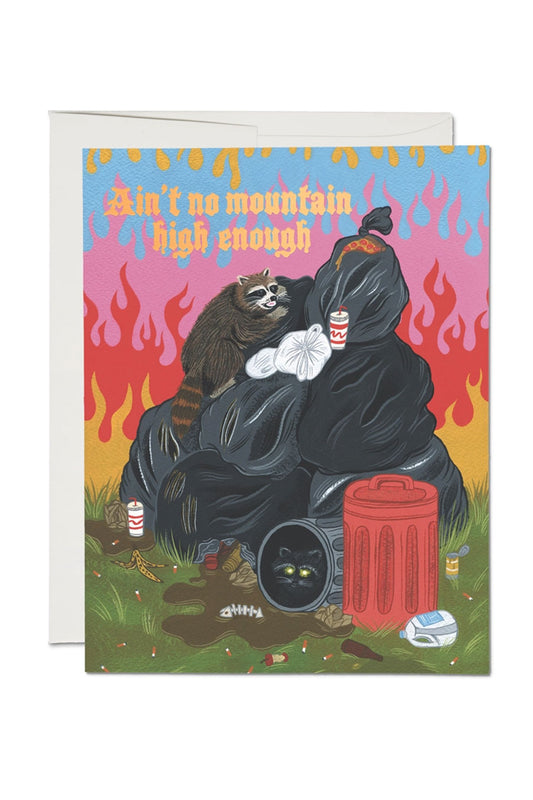Greeting card of Raccoons digging in a pile of garbage in front of a fire skyscape. The card says Ain't No Mountain High Enough.