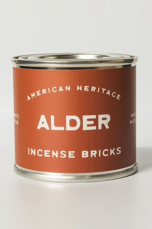 Tin of incense bricks. The label is rust orange and says American Heritage Alder Incense Bricks.