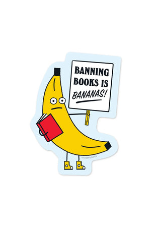 Die Cut sticker of a banana holding a book and a protest sign that says Banning Books is Bananas!