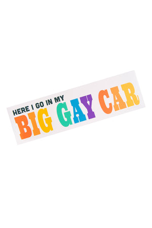 White bumper sticker that says HERE I GO IN MY BIG GAY CAR.  Big Gay Car is in rainbow text. 