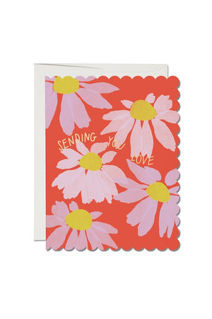 Scalloped edge greeting card of coneflowers. Card says Sending You Love.