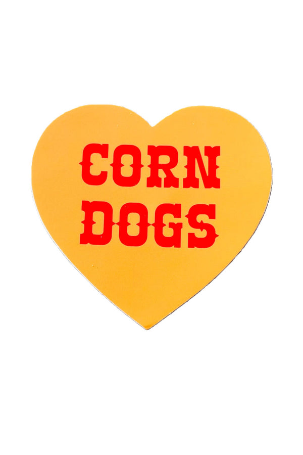 Vinyl sticker of a yellow heart with red text inside that says Corn Dogs. White background.