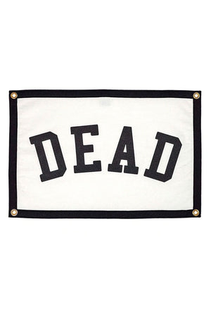 White camp flag with black edges and grommets. The Flag says DEAD in black lettering. White background.