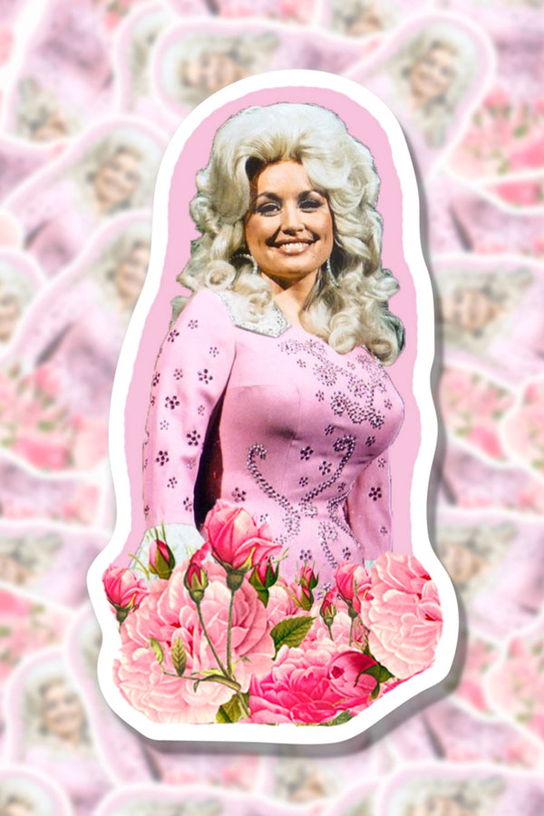 Vinyl sticker of Dolly Parton in a pink dress surrounded by pink roses.