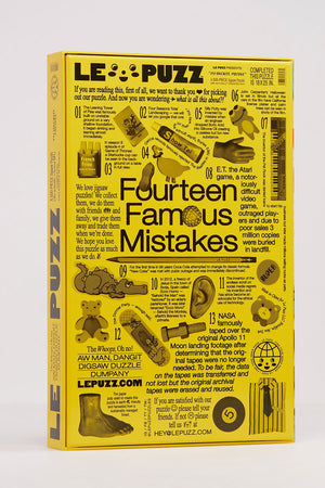 The back of the 500 piece puzzle called My Favorite Mistake. The back of the puzzle features 13 different famous mistakes made in history.