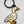 Load image into Gallery viewer, Enamel keychain with black hardware of a white duck.
