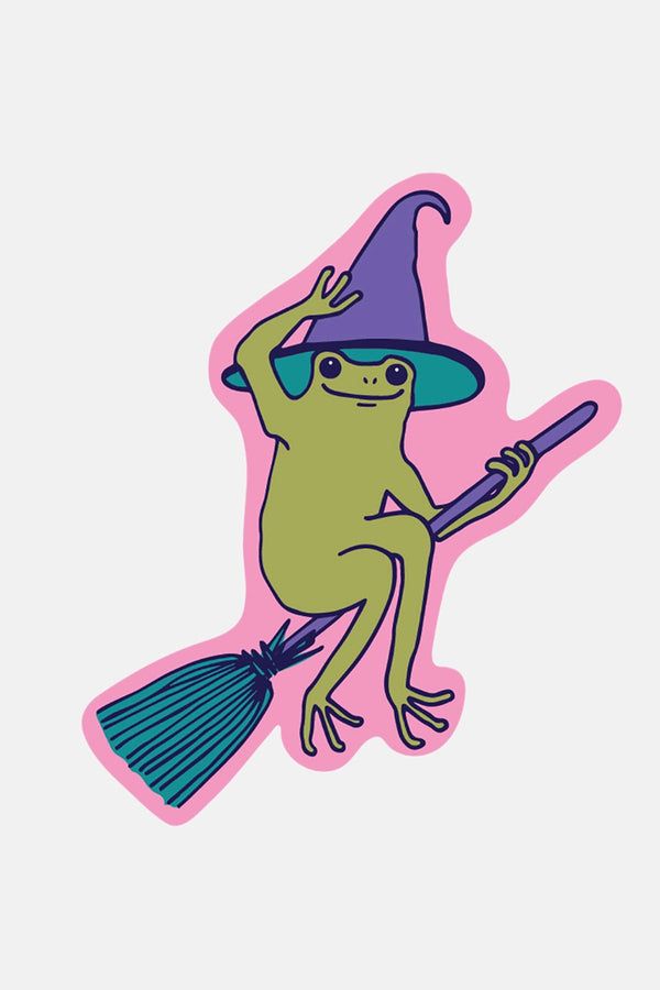 Die cut sticker of a Frog wearing a witch hat, sitting on top of a broom.