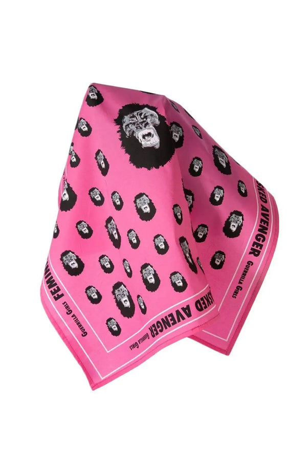 Pink bandana of an all over pattern of Gorilla faces. The border of the bandana says Feminine Masked Avenger, Guerrilla Girls. Whie background.