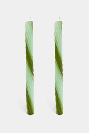 Pair of rope candles in mint and olive green gradient stripes.