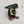 Load image into Gallery viewer, Enamel Pin of a frog sitting on a toadstool holding a leaf as a umbrella.
