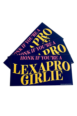 Navy blue bumper sticker that says Honk if you're and Lexapro Girlie. White background.