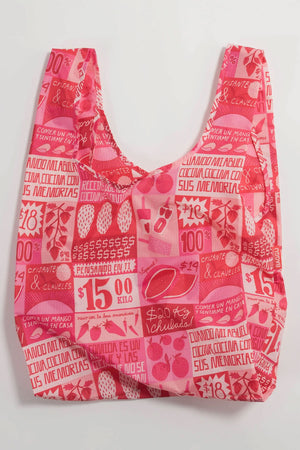 Pink and Red reusable tote bag featuring different illustrated grocery signs inspired by Mexico City.