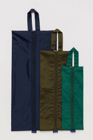 Nylon storage backs in three different sizes. Teal, Army Green, and Navy.