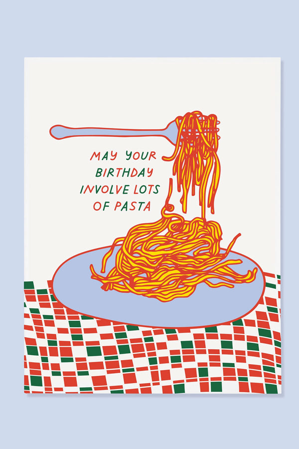 Greeting card featuring a plate of spaghetti on a red and green checkered tablecloth. The card says May your birthday involve lots of pasta.