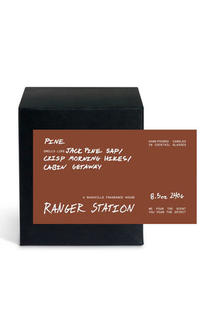Black candle box with brown label that says Ranger Station A Nashville Fragrance House. The scent is Pine.