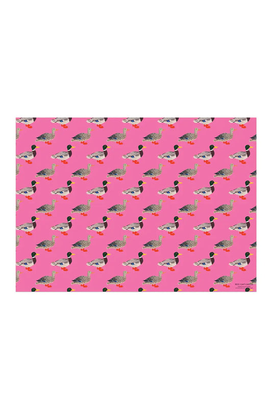 Pink wrapping paper featuring a duck pattern
