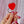 Load image into Gallery viewer, Someone holding a Red heart shaped lollipop with silver hardware.
