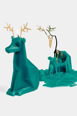 Teal reindeer shaped candle with a metal frame inside. Metal antlers. White background.