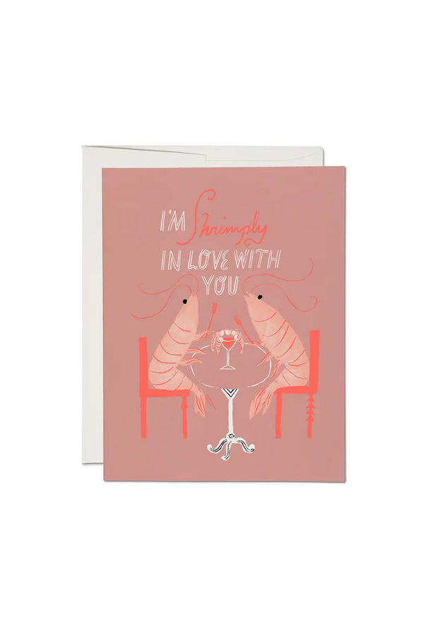 Greeting card of two Shrimp dining at a table with Shrimp cocktail. Card says I'm Shrimply In Love with You