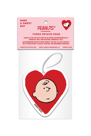 Air Freshener in the shape of a heart featuring Charlie Brown on the back. Scent is lavender.