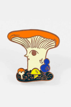 enamel pin of a Mushroom with a face and red top. Surrounded by smaller mushrooms in red, yellow and blue.