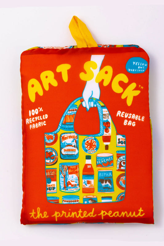 Refusuable tote bag. The tote holder is red and features an illustration of the tote bag which is yellow and covered in different packaged food items.