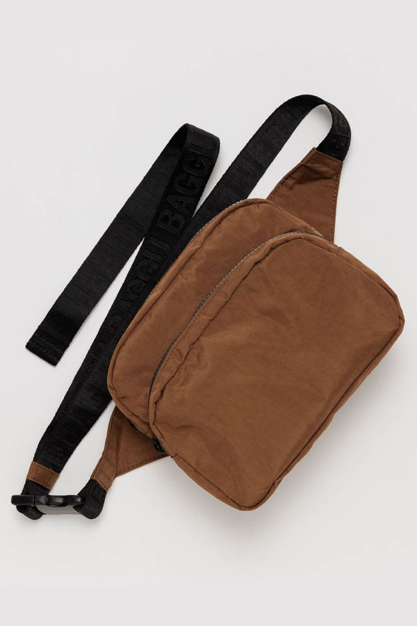 Brown fanny pack with two compartments and black nylon straps. White background.