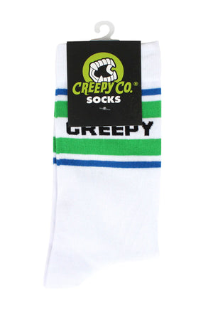 Pair of white athletic socks. The socks say Creepy across the top in black text surrounded by green and blue stripes. The bottom of the socks say Creepy Co. in black text. White background.