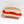 Load image into Gallery viewer, Hot dog with mustard shaped hair clip. White background.
