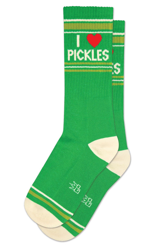 One pair of green mid calf athletic socks with a white heel and toe. Light green and and white stripes run across the toes and around the top of the socks. In white lettering the socks say I Heart Pickles. White background.