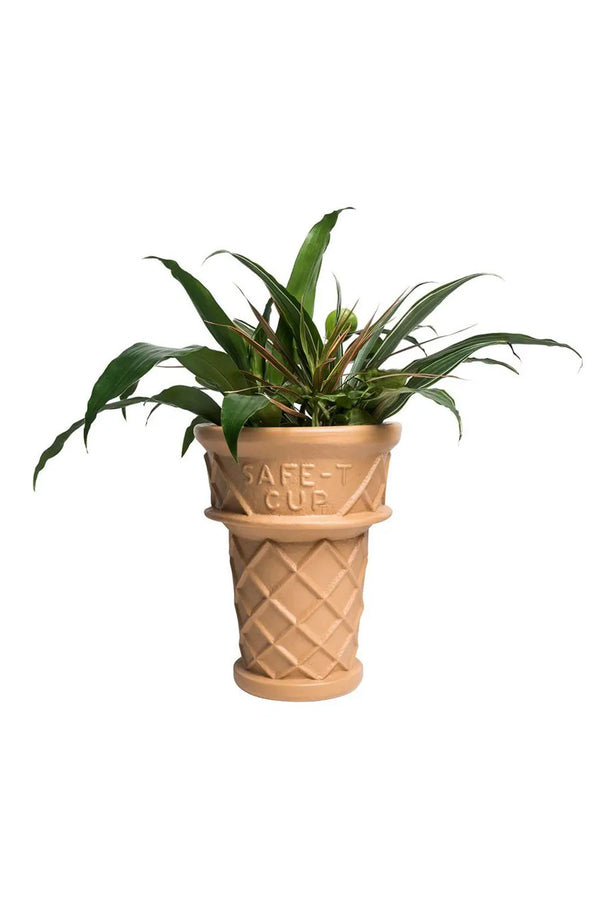 Ice cream cone shaped planter holding a plant. White background. Plant not included.