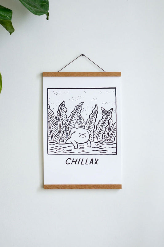 Magnetic print frame hanging on a white wall. Print not included.