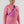 Load image into Gallery viewer, Woman wearing a pink nylon fanny pack with black strapsacross her chest.
