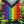 Load image into Gallery viewer, Progress Pride flag hanging from a garden pole placed in a garden. The Progress Pride Flag includes a black, brown, blue, pink and white stripe layered on top of the rainbow colors.
