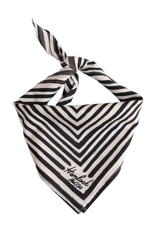 Knotted and tied black and white lined bandana. White background.