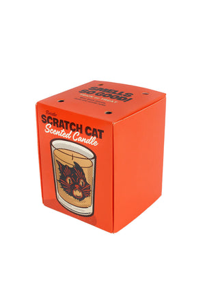 Orange candle box. The box holds a scented candle that features Beistle black cat on the front. White background.