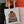 Load image into Gallery viewer, Person holding natural cotton tote bag featuring a jackolantern with a black kitten inside peeking its head out of the top of the pumpkin. Under the pumpkin the tote says Spooky season in large black bubbly letters.
