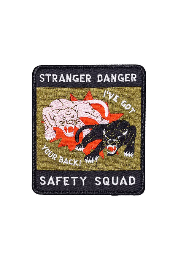 Black rectangle patch with a green olive square that features two panthers, one black and one white set against a red starburst. The patch says I've got your back in white lettering above and below the panthers. Above the green square the patch says Stranger Danger and below it says Safety Squad in white lettering. White background.