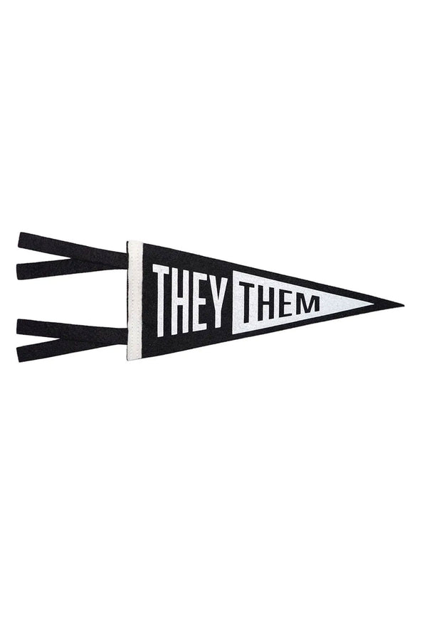 Black pennant flag that has a white edge. Half of the flag is black and the the other half is white. The flag says They in white lettering against the black half. And on the white half of the flag it says Them in Black lettering. White background.
