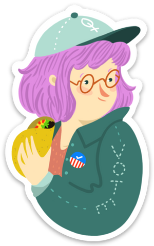 A close up of a "voter girl" with a teal baseball cap with the feminine symbol, with purple hair and brown glasses. She is wearing an orange undershirt with a dark green jacket. Her jacket is adorned with a voting sticker and the words "vote" sewn into the seam of her jacket. She is holding a taco.