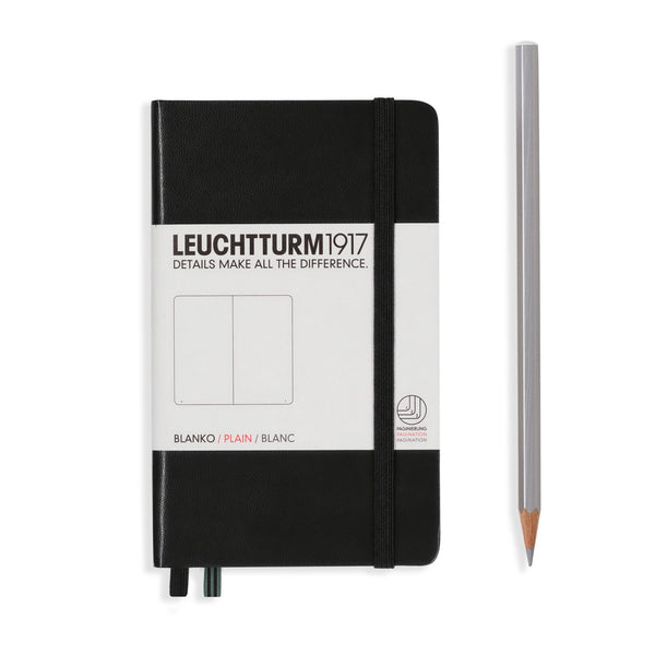 Black pocket sized hardcover notebook with blank pages. Pencil not included.