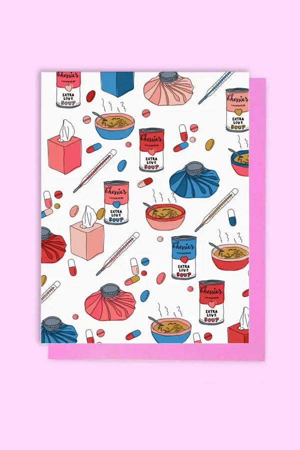 A 'get well soon' colorful greeting card with illustrations of cans of soup, boxes of kleenex, pills, and thermometers on a light pink background