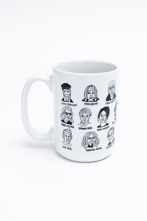 A white ceramic coffee mug showing illustrations of historically significant female artists.