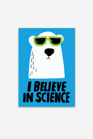 A vertical rectangular sticker depicting an illustrated polar bear wearing green sunglasses. The text reads "I believe in science" with a light blue background and black lettering.