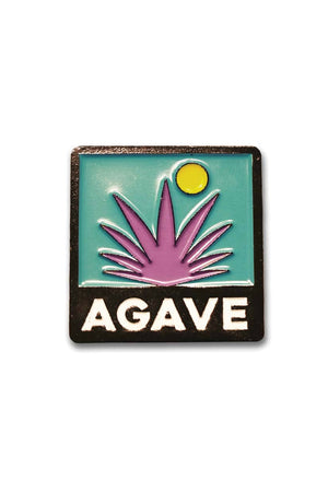 Enamel pin depicting a pink agave plant with a sun in the background. Text on the pin reads "AGAVE"